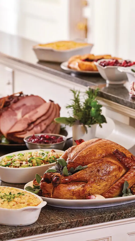 This is an image of Thanksgiving quotes. Roasted Thanksgiving turkey and side dishes.