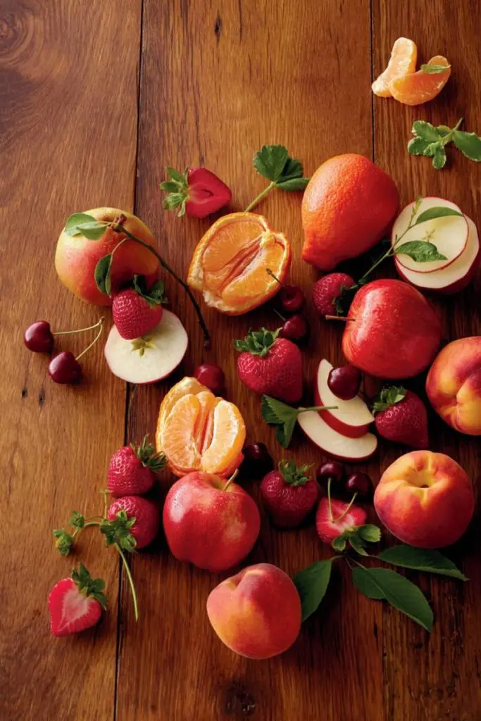 Fruit of The Month Club: peaches, oranges, berries, cherries