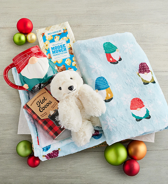 Christmas towel, stuffed animal, and mug.