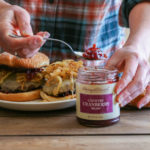 A Must-Try Burger Recipe That’s Grilled to Perfection With Caramelized Onions and Cranberry Relish