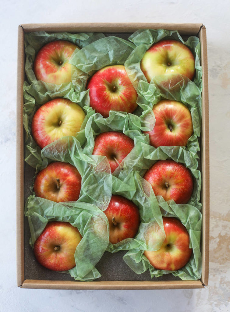 Box of apples for apple pie recipe.