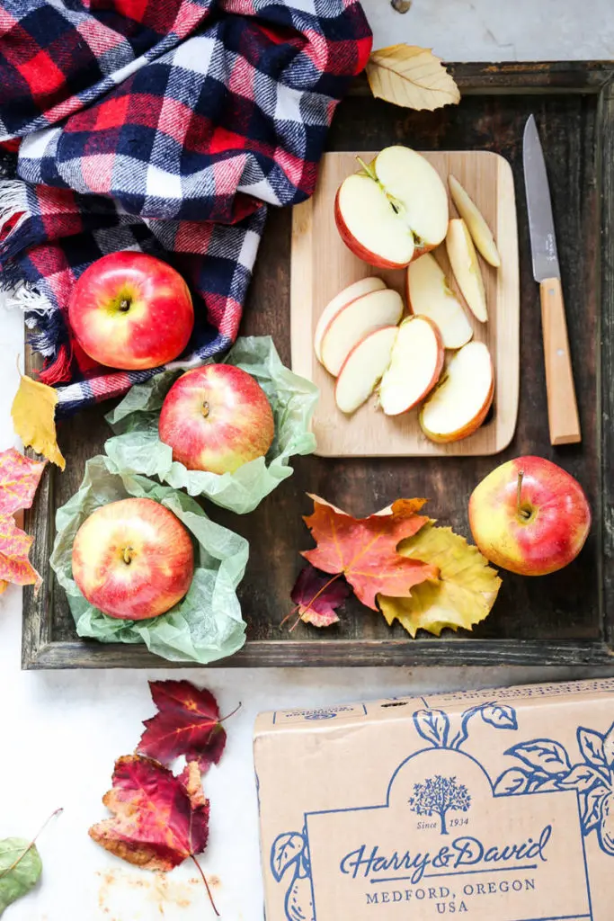 Sliced apples for apple stuffing on a board.