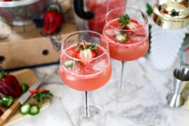 Strawberry cocktail with jalepeño slices and lemon juice