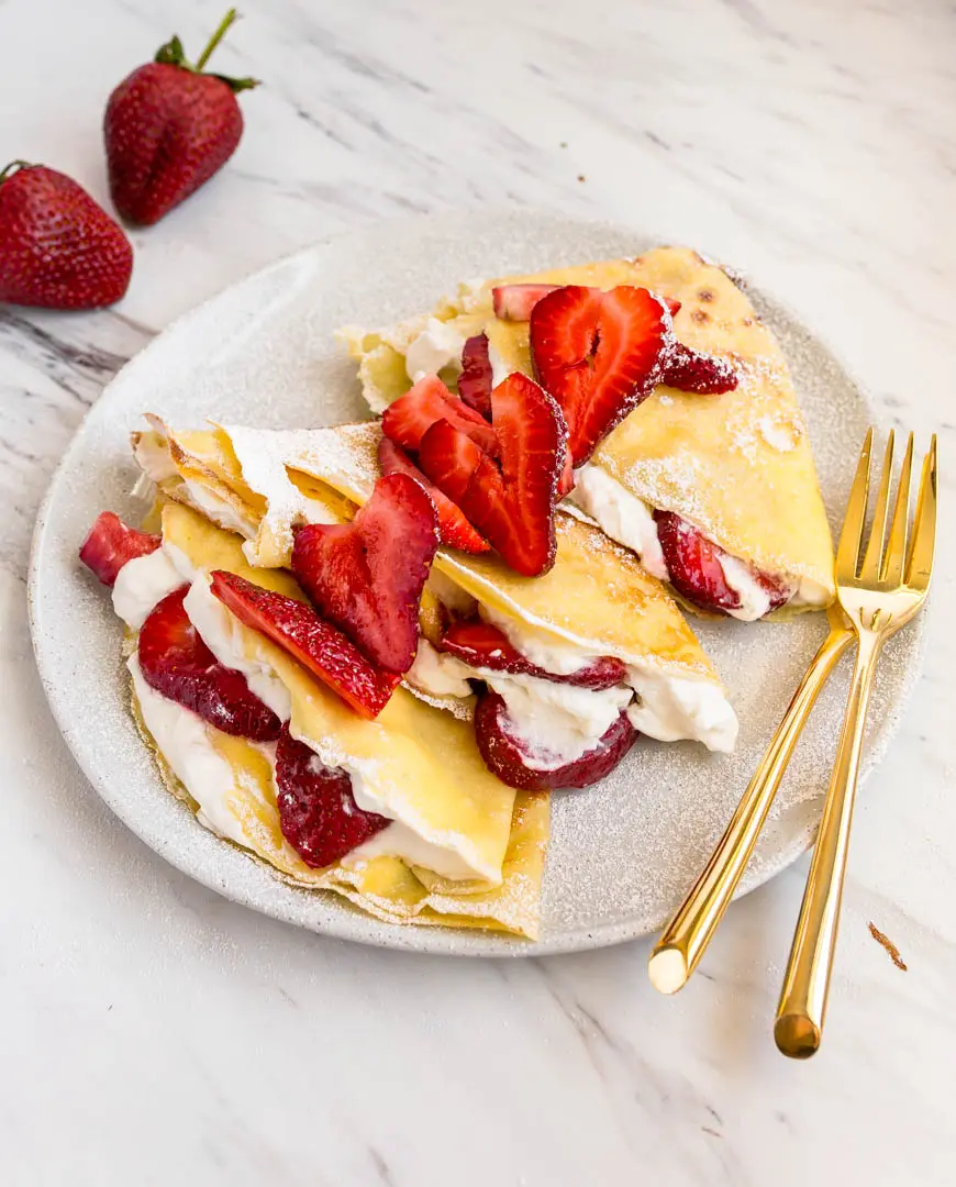 strawberry crepes with whipped cream