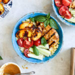 summer bowl with honey lime chicken and grilled peaches