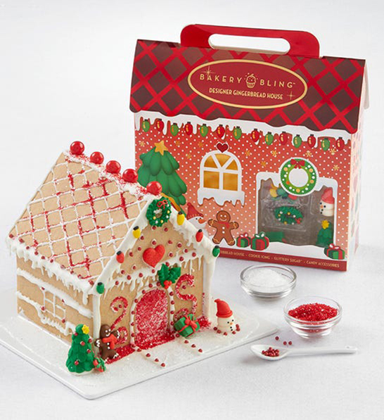 A photo of Christmas gifts under $30 with a holiday gingerbread kit and a gingerbread house