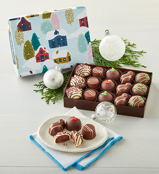 A photo of Christmas gifts under $30 with a box of artisan holiday truffles