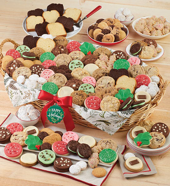 A photo of gift baskets with an overflowing basket of cookies and cakes
