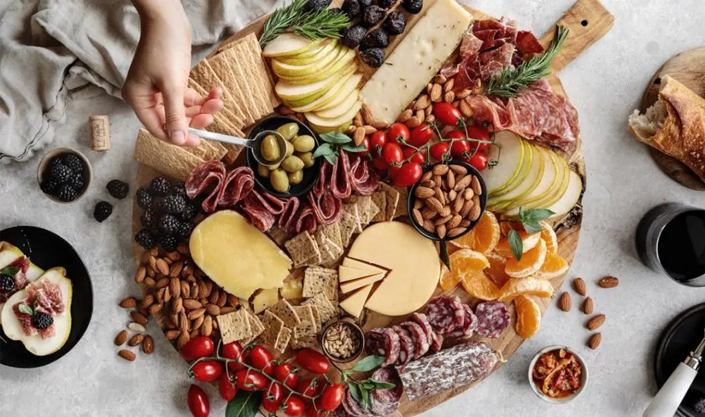 A photo of Father's Day recipes with a charcuterie board.