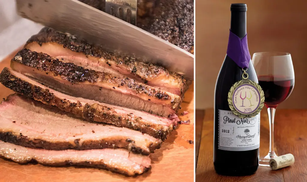 BBQ wine pairings with sliced brisket next to a bottle of pinot noir.