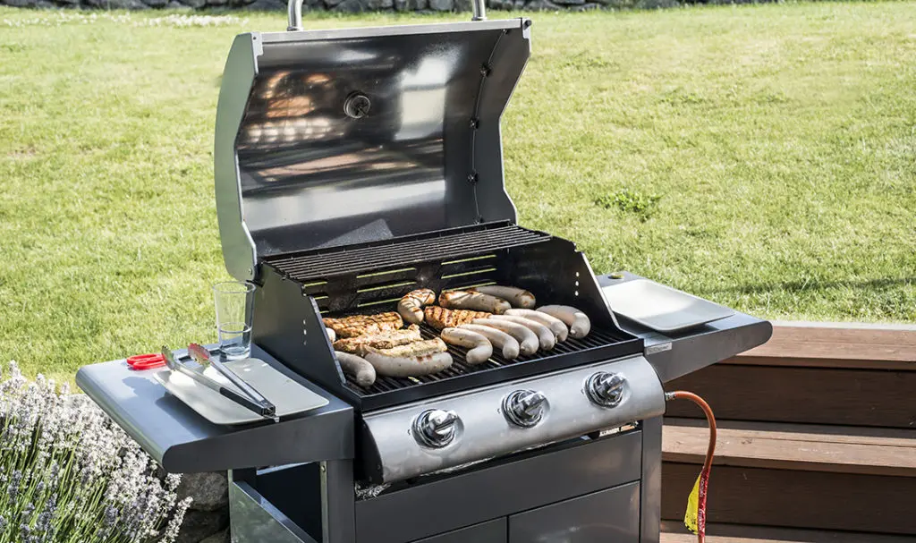 Grill guide with a gas grill covered in sausage.