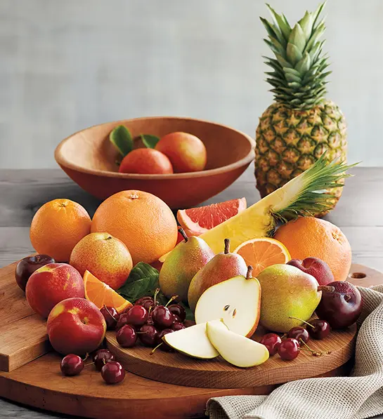 Last-minute Father's Day gift ideas with an array of fruit in bowls and on plates.
