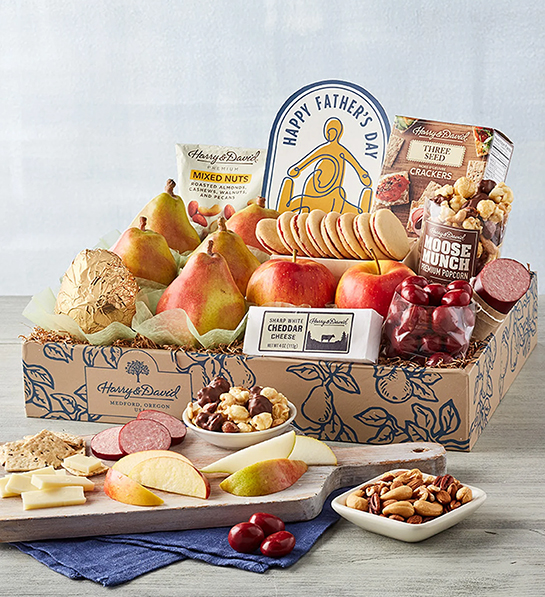 Last-minute Father's Day gift ideas with a box of fruit, cheese, snacks, and other ingredients.