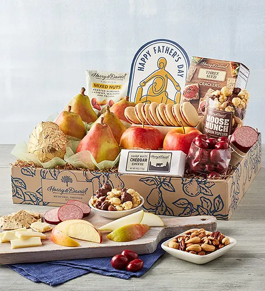 Last-minute Father's Day gift ideas with a box of fruit, cheese, snacks, and other ingredients.