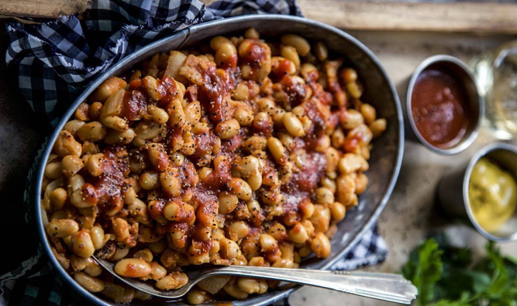 A photo of Father's Day recipes with a bowl of baked beans.