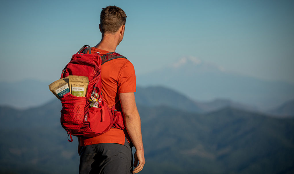 make the most of summer -- man hiking image