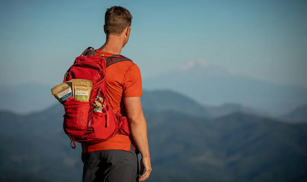 Photo of make the most of summer with a man hiking.