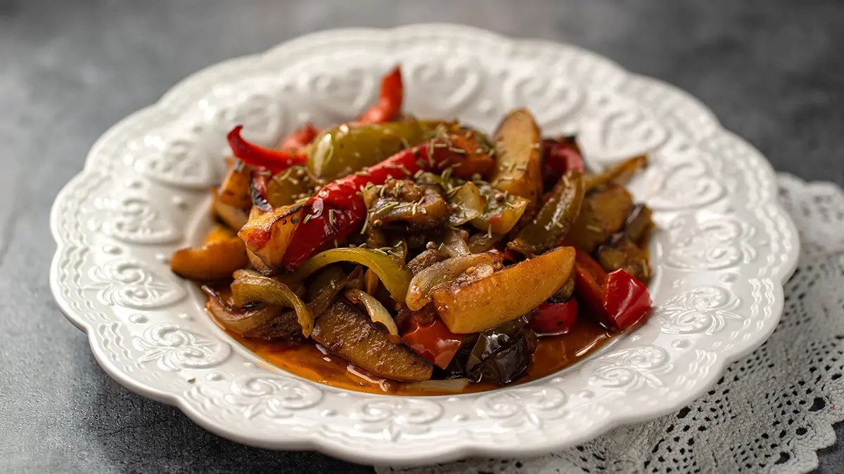 Fall flavors image - vegetable stew ciambotta in a white bowl