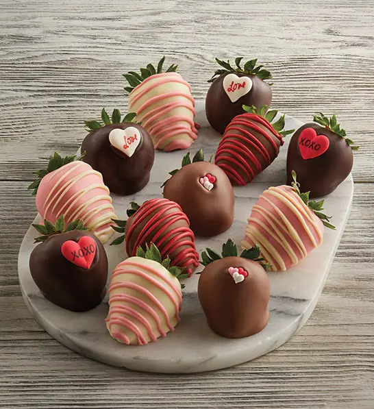 anniversary gift guide image - chocolate covered strawberries displayed on board