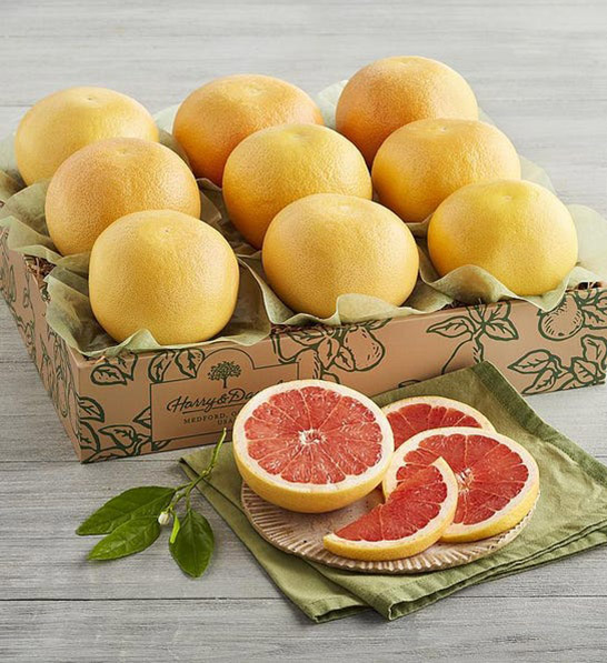 anniversary gift guide image - box of ruby grapefruits with one cut up into slices 