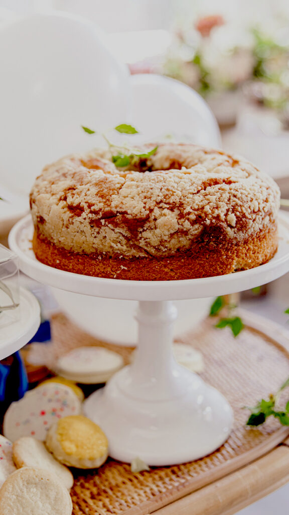 host a baby shower image - coffee cake on a stand