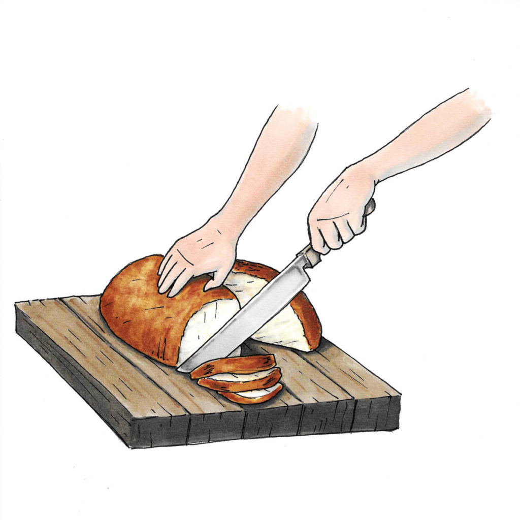 A photo of how to carve a turkey with a hand using a knife to slice turkey meat