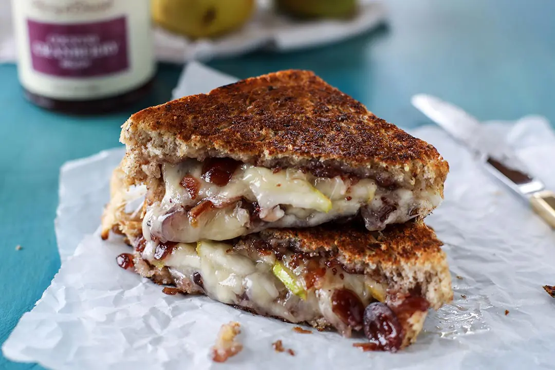 Thanksgiving leftovers made into a cranberry and pear grilled cheese sandwich