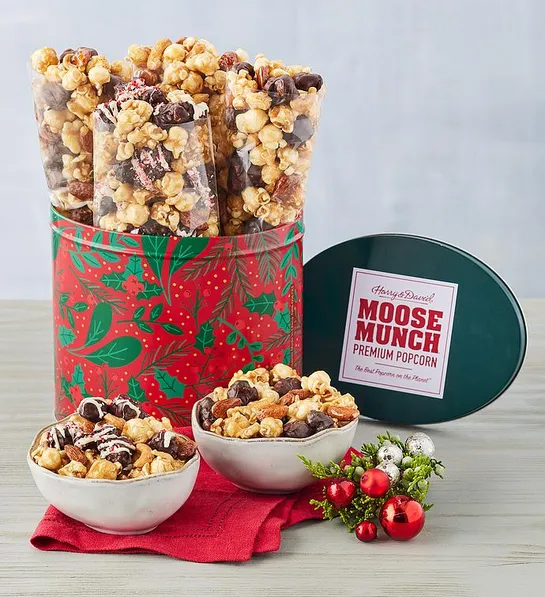 Gifts under $30 with a Christmas decorated tin full of Moose Munch popcorn.