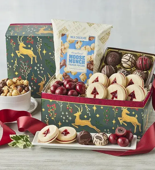 Gifts under $30 for Christmas with a box full of truffles, cookies, chocolate and Moose Munch.