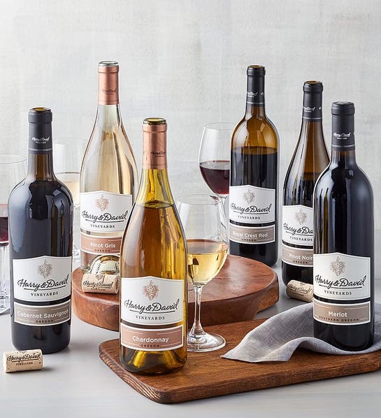 A photo of the ultimate wine gift with six bottles of wine on a table