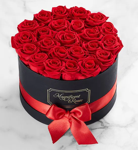A photo of corporate gifting for the new year with 24 roses wrapped together by a red bow.