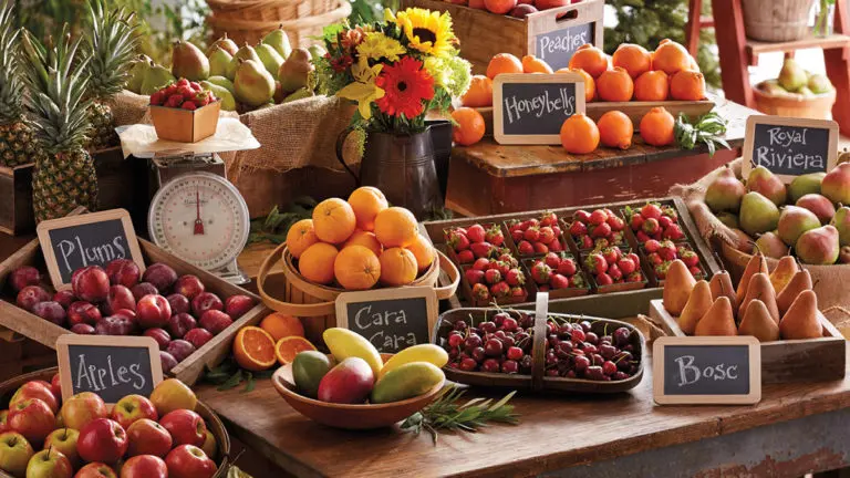 A photo of healthy fruit with baskets and boxes of fruit displayed on several tables