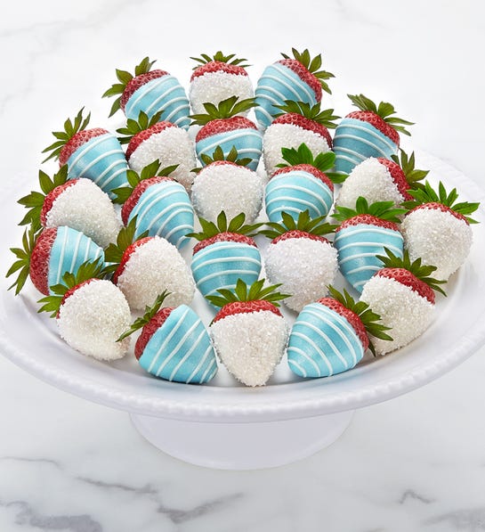 A photo of last minute gifts with a serving tray of decorated strawberries.