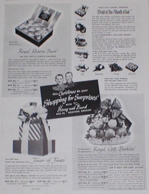 A photo of tower of treats with a brochure from the 1950's with ads for different gifts.