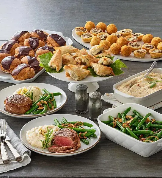 Valentine's Day gifts for him with a full filet mignon meal on platters.