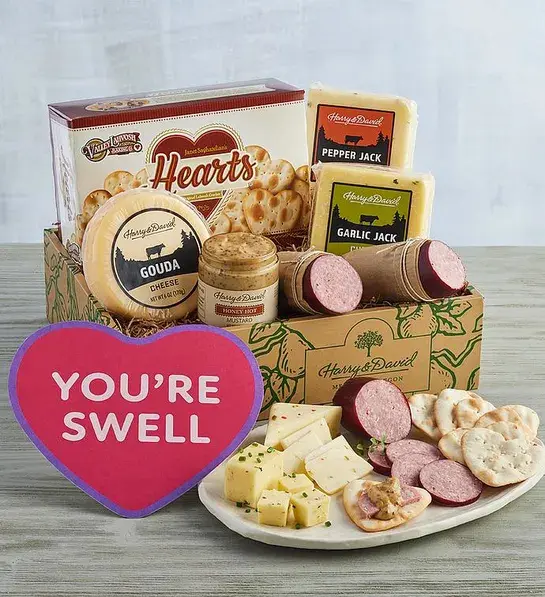 Valentine's Day gifts for him with a box of meat and cheese with a heart shaped card that reads, "you're swell".