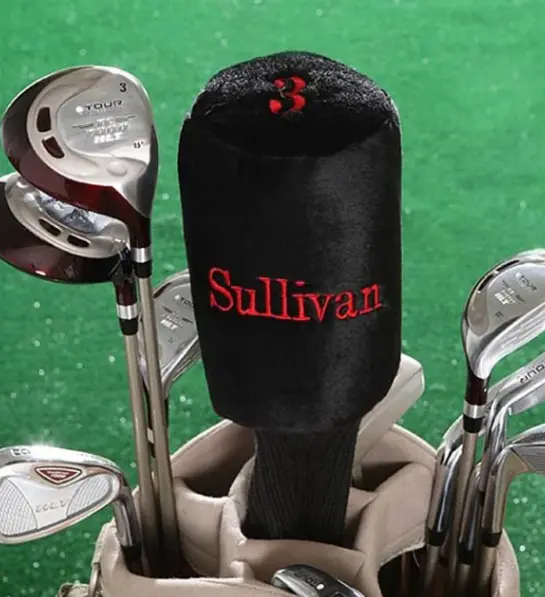 A photo of gifts for men with a customized golf club cover with the name "Sullivan" printed on it.