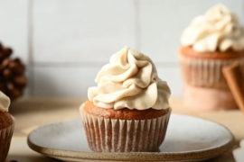 cupcake recipe with a frosted cupcake sitting on a plate
