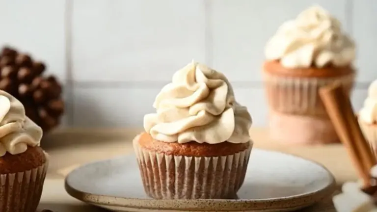 cupcake recipe with a frosted cupcake sitting on a plate