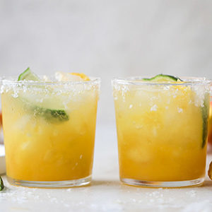 A photo of April recipes with a two honeybell margaritas