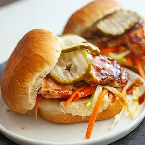 A photo of chicken recipes with two chicken sliders on a plate