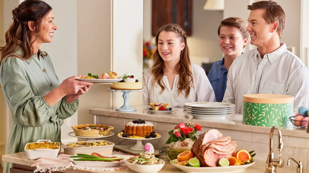 Easter food traditions with a family eating an Easter meal.