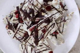 A photo of white chocolate with a plate of white chocolate bark on a plate