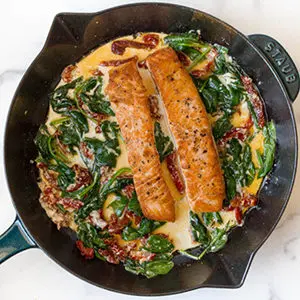 A photo of may recipes with a pan of salmon