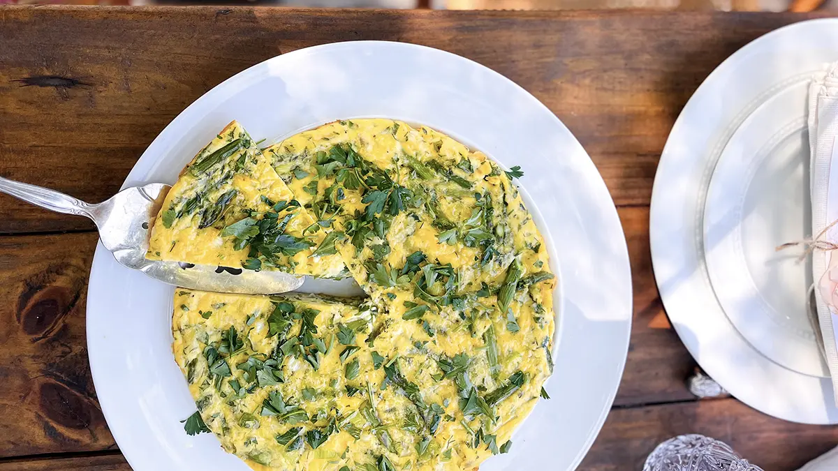 A photo of Mother's Day brunch recipes with a vegetable frittata on a plate