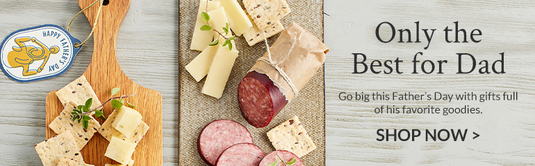 A photo of Father's Day gift guide with a board of meats and cheeses.