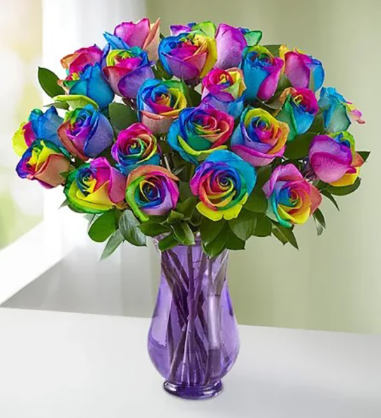 A photo of june birthdays with a bouquet of kaleidoscope roses 