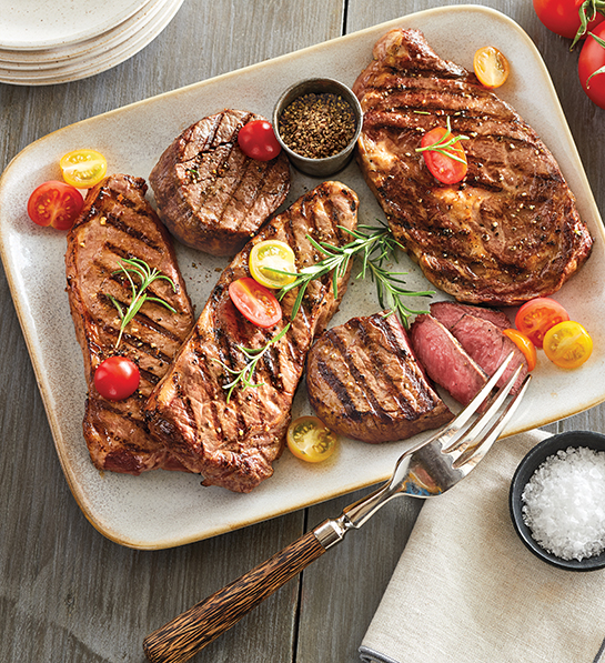 A photo of father's day gift ideas with a plate of cooked steak