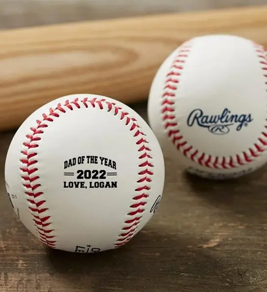 A photo of father's day gift ideas with two personalized baseballs