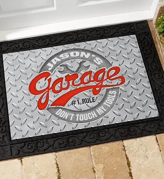 A photo of father's day gift guide with a personalized door mat
